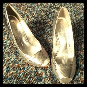 Size 38 Also silver pumps